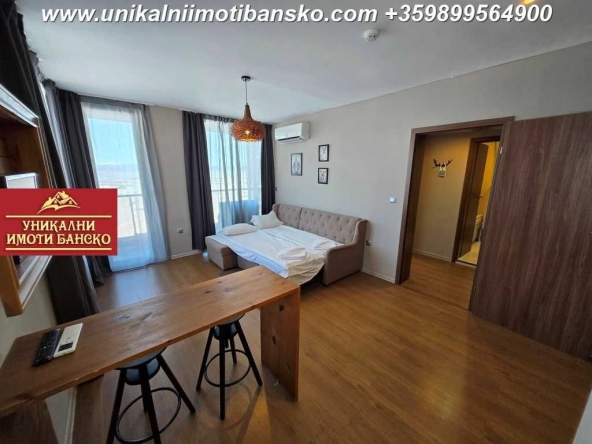 Двустаен апартамент в Банско - 58 кв.м за 1035 €/кв.м - Снимка #1