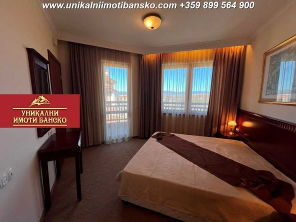 Тристаен апартамент в Банско - 98 кв.м за 1205 €/кв.м - Снимка #1