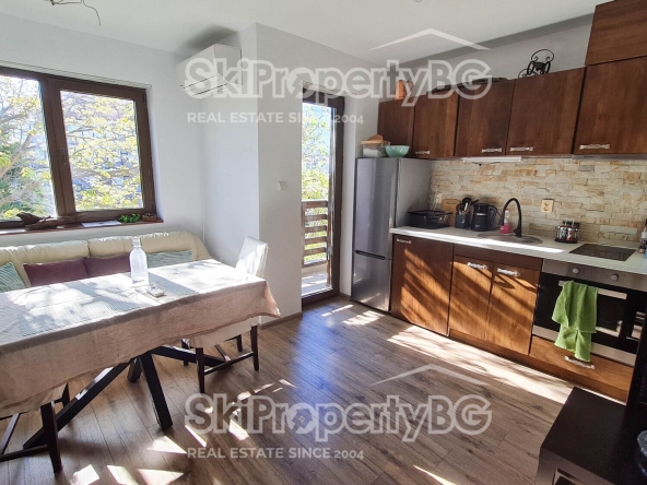 Тристаен апартамент в Банско - 69 кв.м за 1522 €/кв.м - Снимка #1