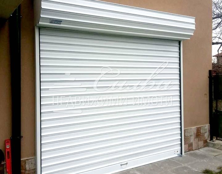 Гараж / Паркомясто в Шумен, 5-ти полк - 21 кв.м за 1336 €/кв.м - Снимка #1