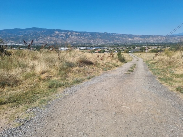 Парцел в Петрич - 1000 кв.м за 57 €/кв.м - Снимка #1